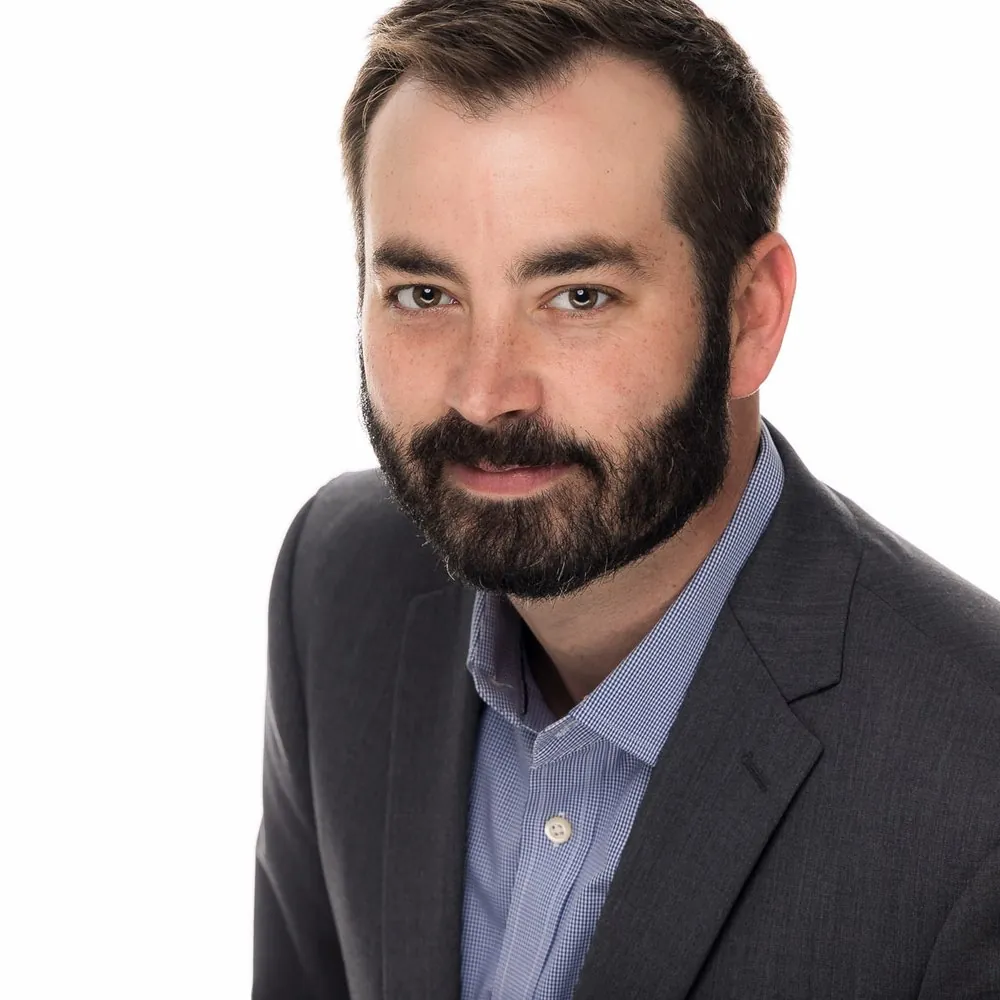 Professional headshot by Sean Thurston Photography